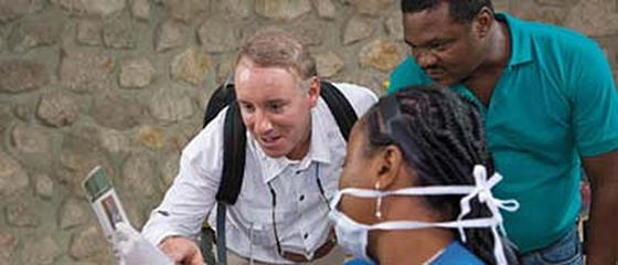 Abbott engineers and scientists share expertise and train local workers in Haiti.